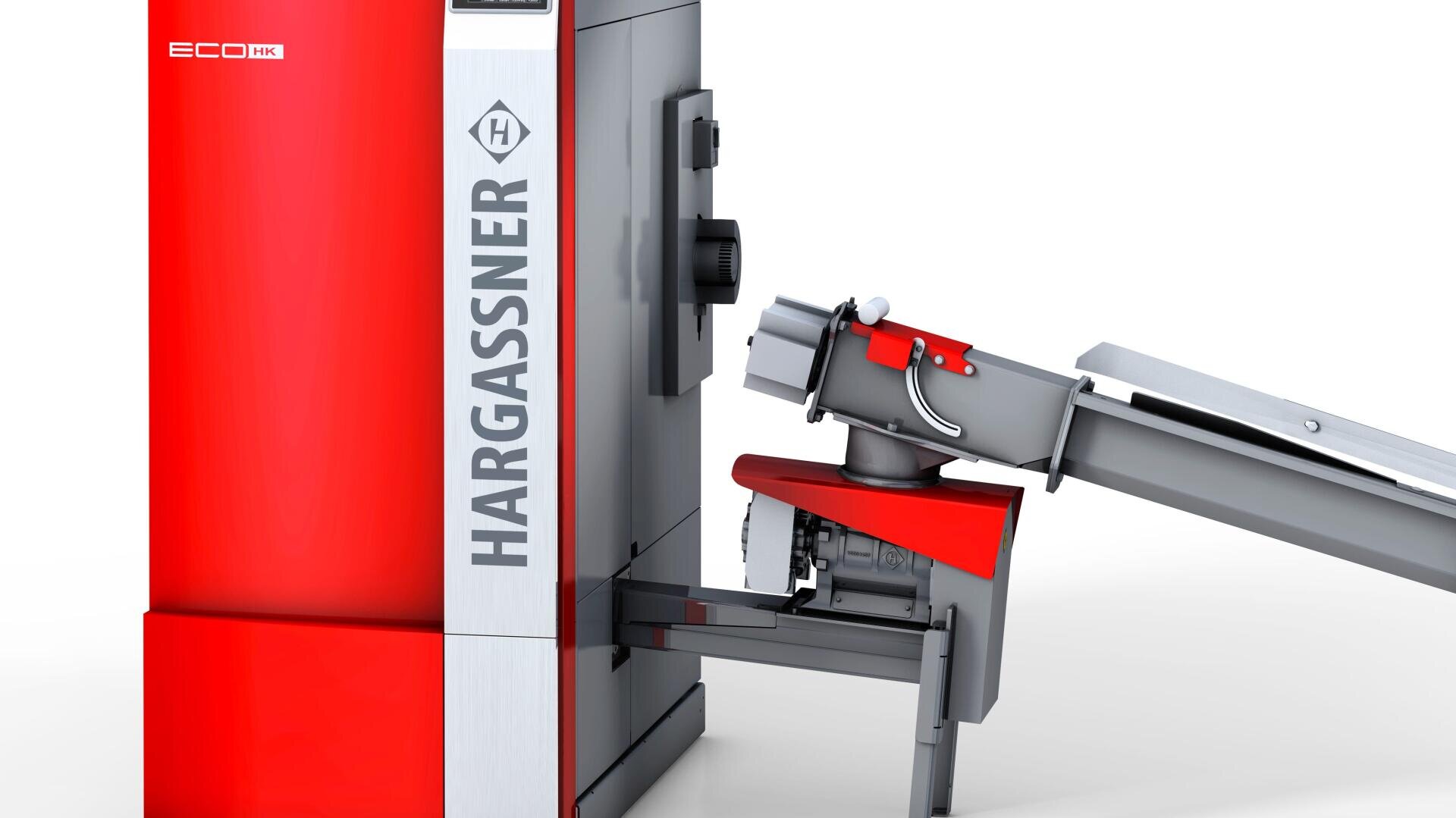 Nahaufnahme eines rot-silbernen Hargassner-Heizsystems mit angeschlossener mechanischer Zuführeinheit, die für die automatische Brennstoffzufuhr verwendet wird. Der Hintergrund ist weiß und unaufgeregt.
