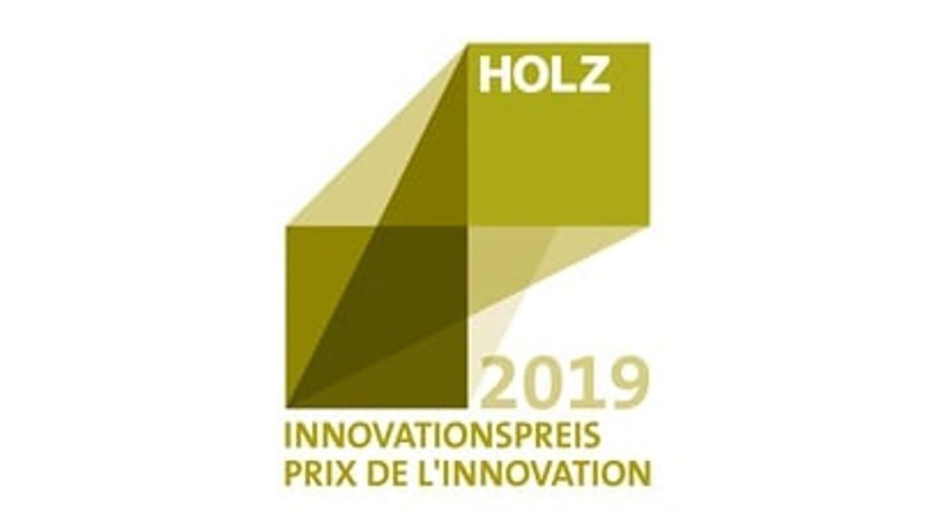 Logo géométrique vert et jaune avec le mot HOLZ en blanc, et le texte en dessous lisant 2019 INNOVATIONSPREIS PRIX DE LINNOVATION sur fond blanc.