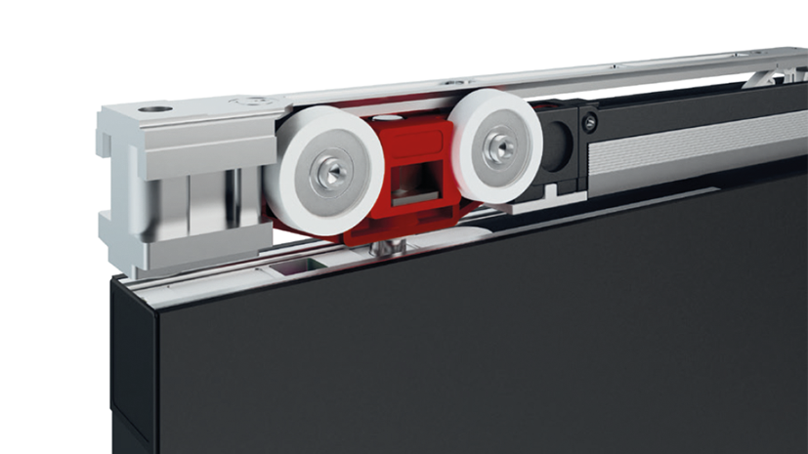 Gros plan d'un mécanisme de porte coulissante avec des rails métalliques, des roues blanches et un support rouge fixé au bord supérieur d'un panneau de porte noir.
